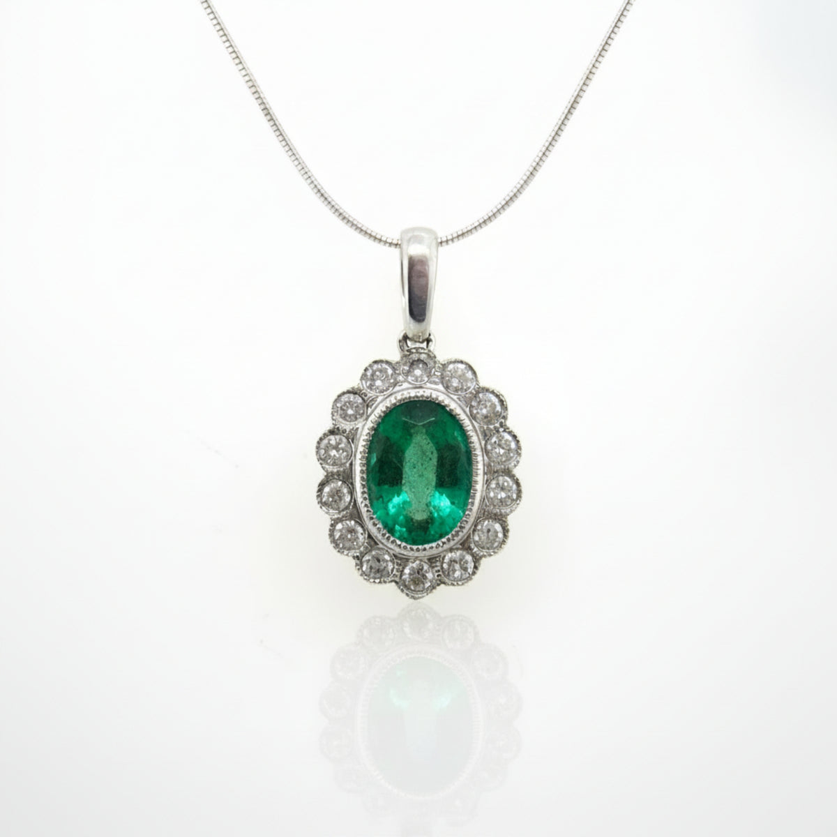 18ct White Gold Emerald & Diamond Pendant