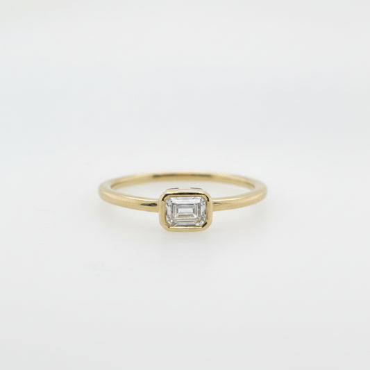 East-West Bezel Set Emerald Cut Lab Grown Diamond Ring